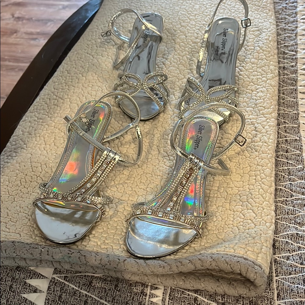 Two pairs Silver Strappy Sandals size 10
Great condition only worn once each.